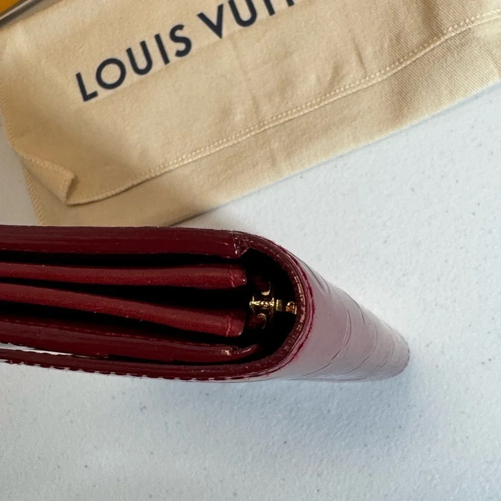 AUTHENTIC Louis Vuitton Red Wallet with Monogram Embossing